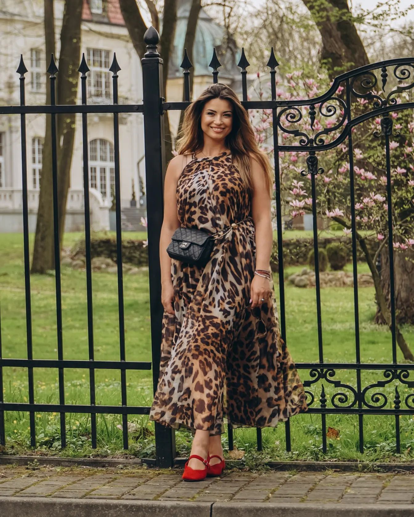 Ivory Tropical Leaf & Floral Printed Poly Chiffon Maxi Dress with Halter Neckline and Flowing