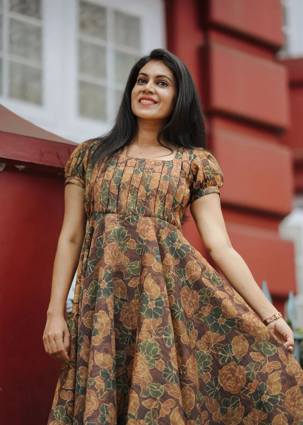 A flowy brown &amp; golden yellow floral print tissue dress