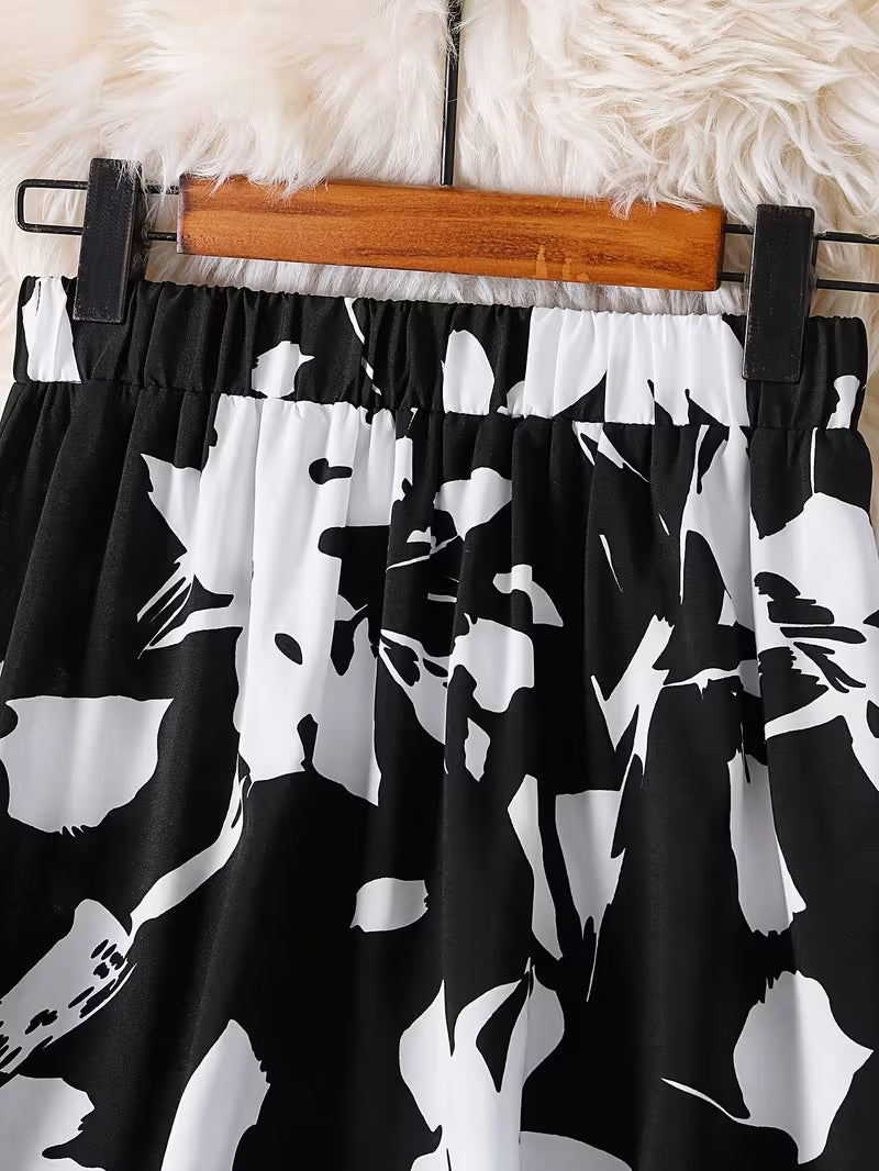 Modern Monochrome Floral Flared Skirt Black Base with White Abstract Florals and Airy Feminine Fit