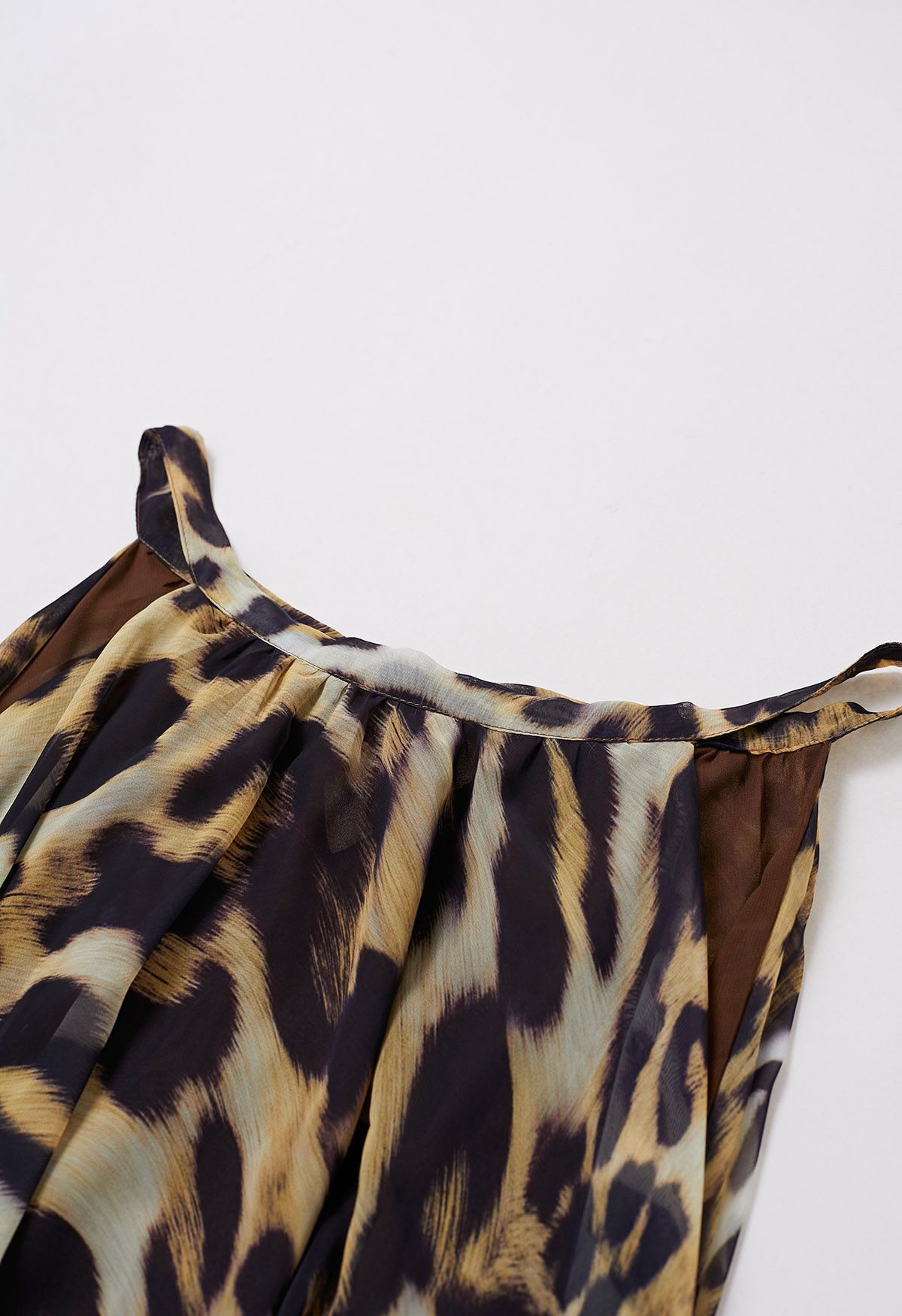 Ivory Tropical Leaf & Floral Printed Poly Chiffon Maxi Dress with Halter Neckline and Flowing