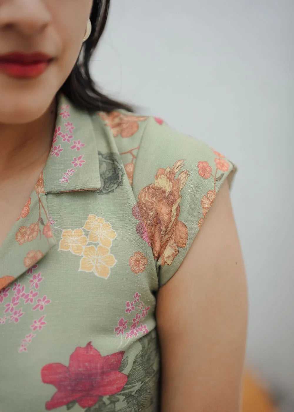 A graceful sage green &amp; multicolour floral print linen dress