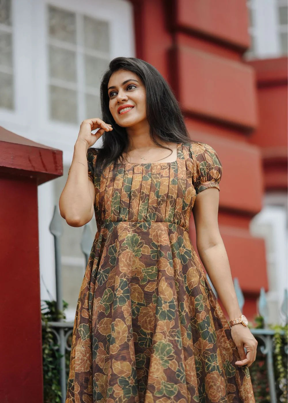 A flowy brown &amp; golden yellow floral print tissue dress