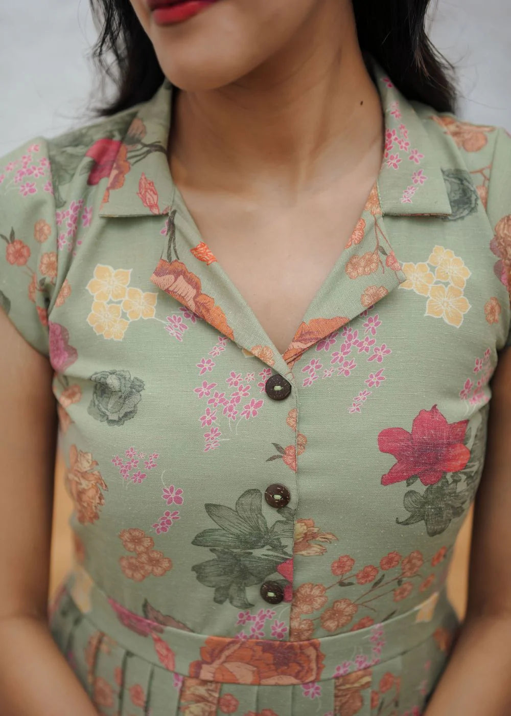 A graceful sage green &amp; multicolour floral print linen dress