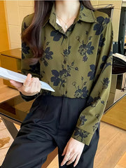 This sophisticated shirt features a rich green base adorned with dark floral Shirt