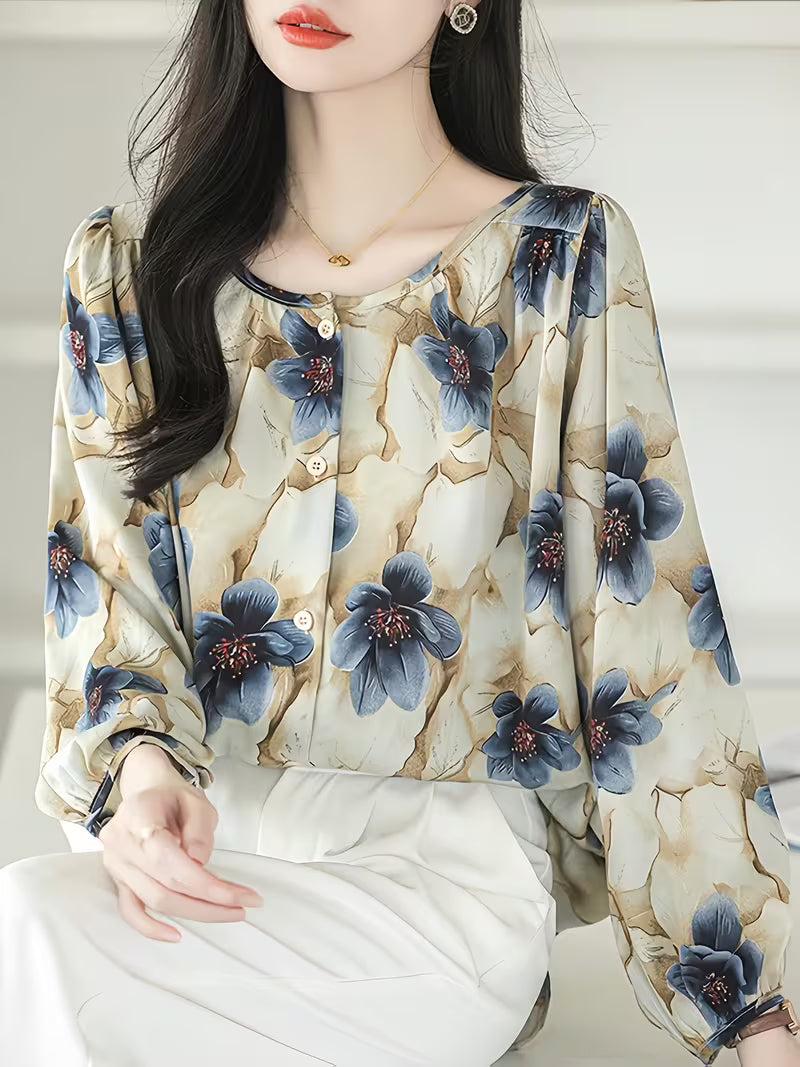 This elegant Top features a dreamy floral print with oversized blue petals, Top