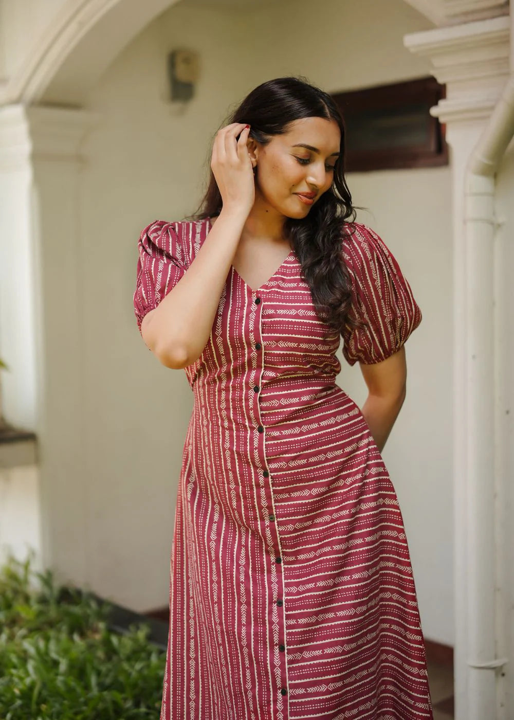 A classy red &amp cream lined dress