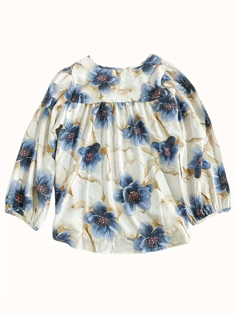 This elegant Top features a dreamy floral print with oversized blue petals, Top