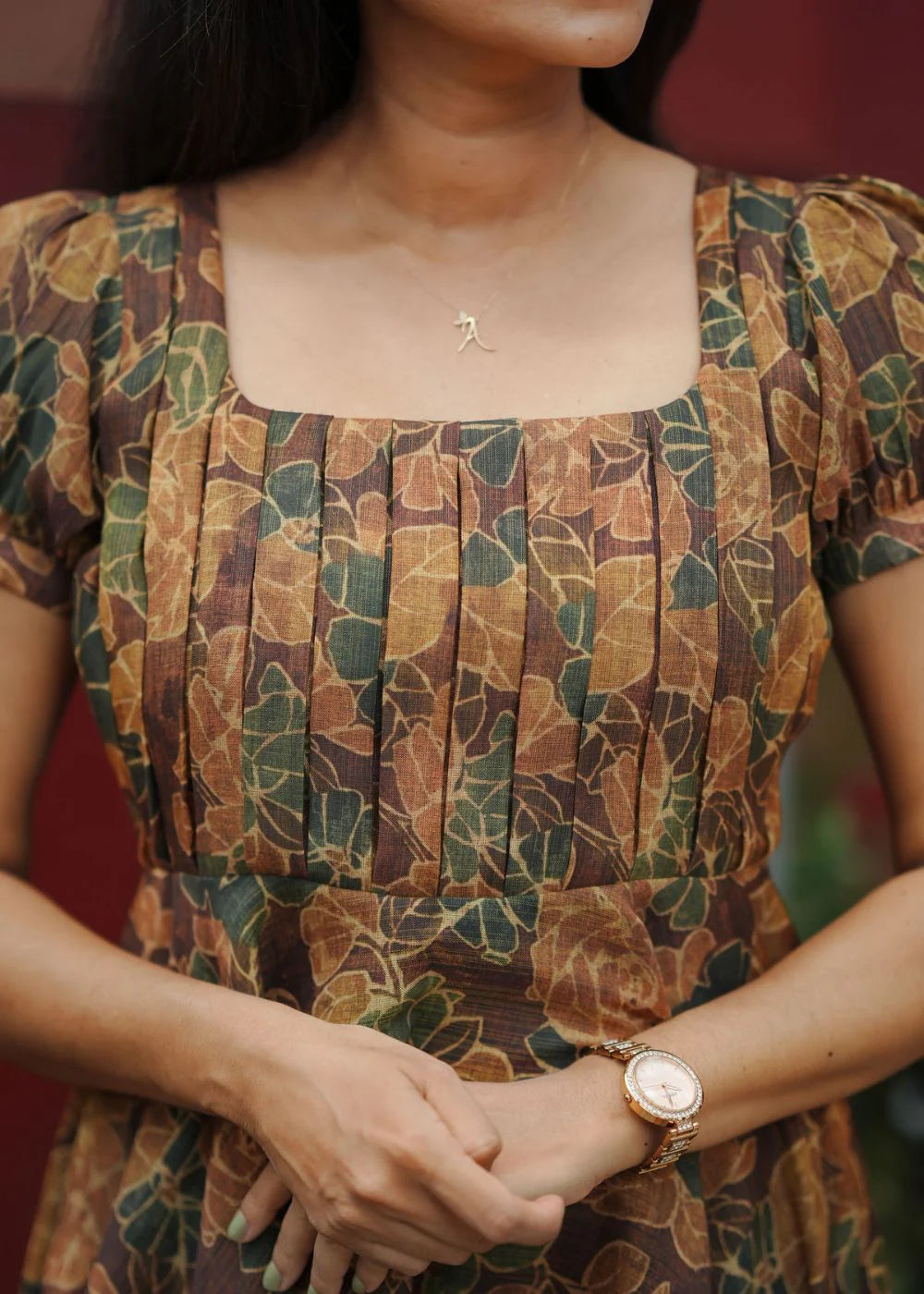 A flowy brown &amp; golden yellow floral print tissue dress