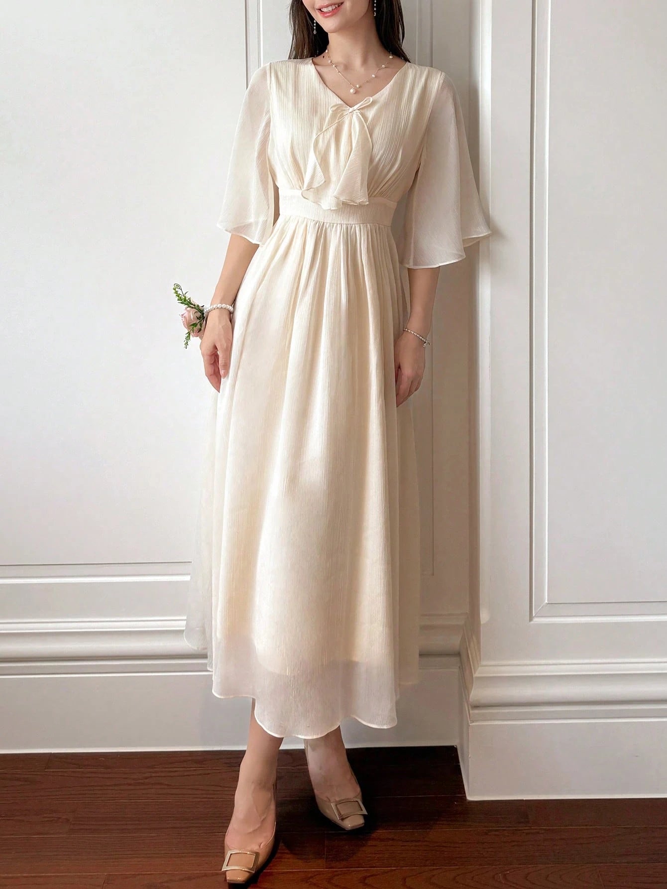 Cream Beige Flowy Maxi Dress with Minimal Elegant Design