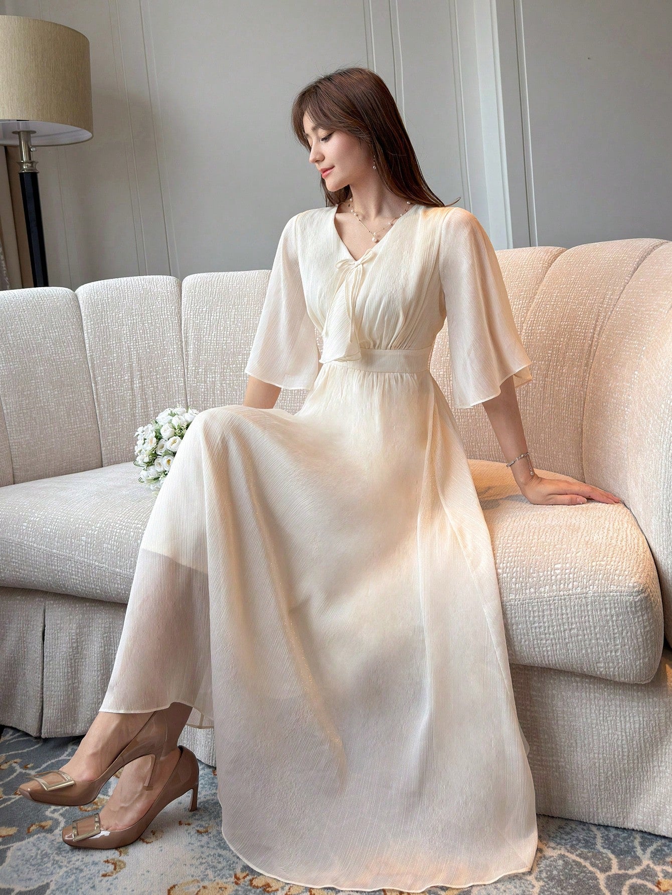 Cream Beige Flowy Maxi Dress with Minimal Elegant Design