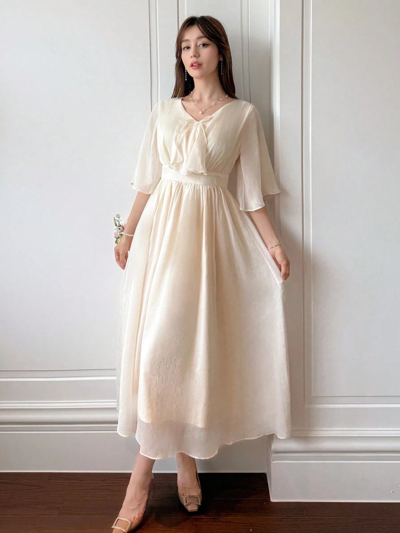 Cream Beige Flowy Maxi Dress with Minimal Elegant Design