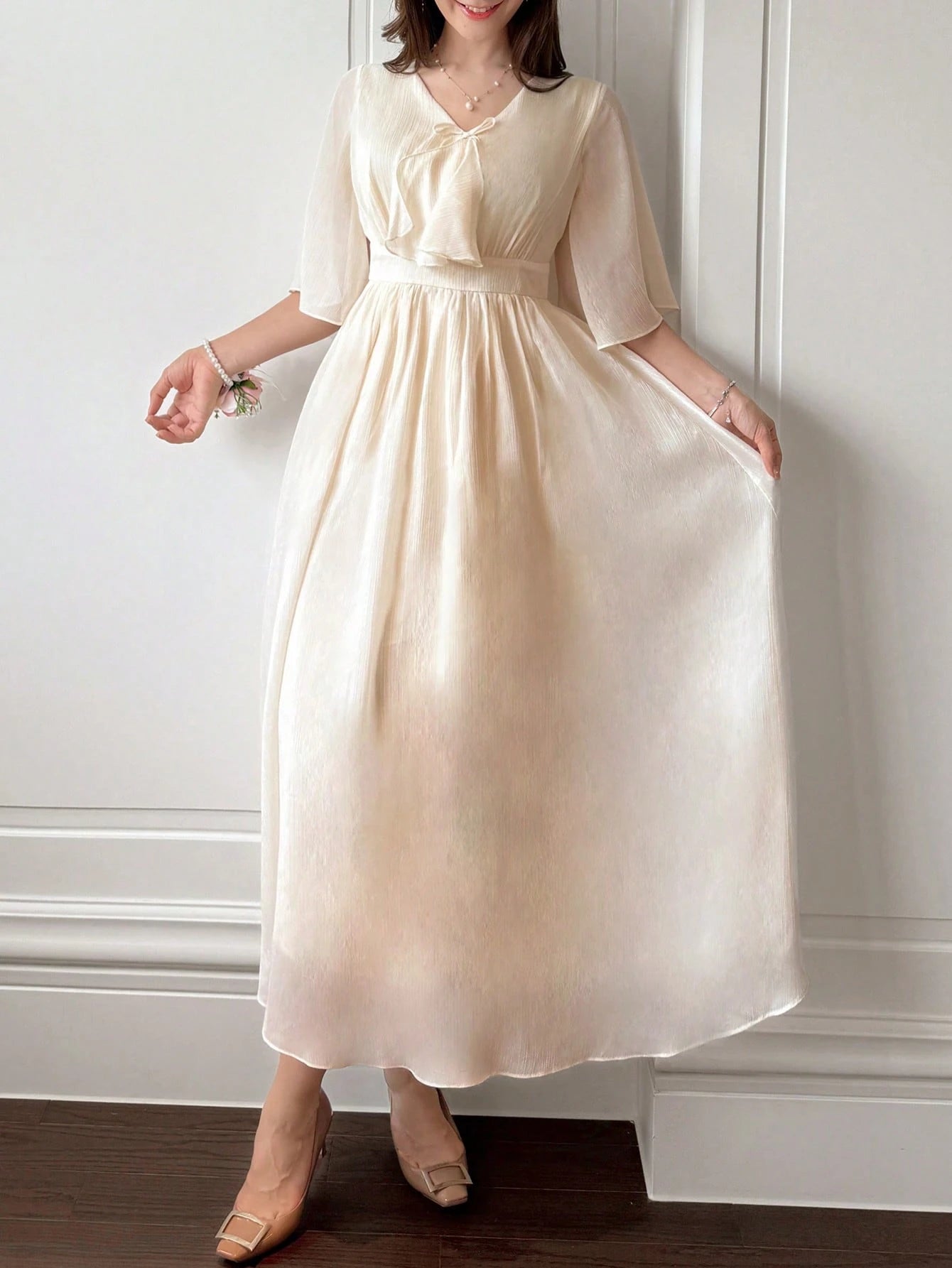 Cream Beige Flowy Maxi Dress with Minimal Elegant Design