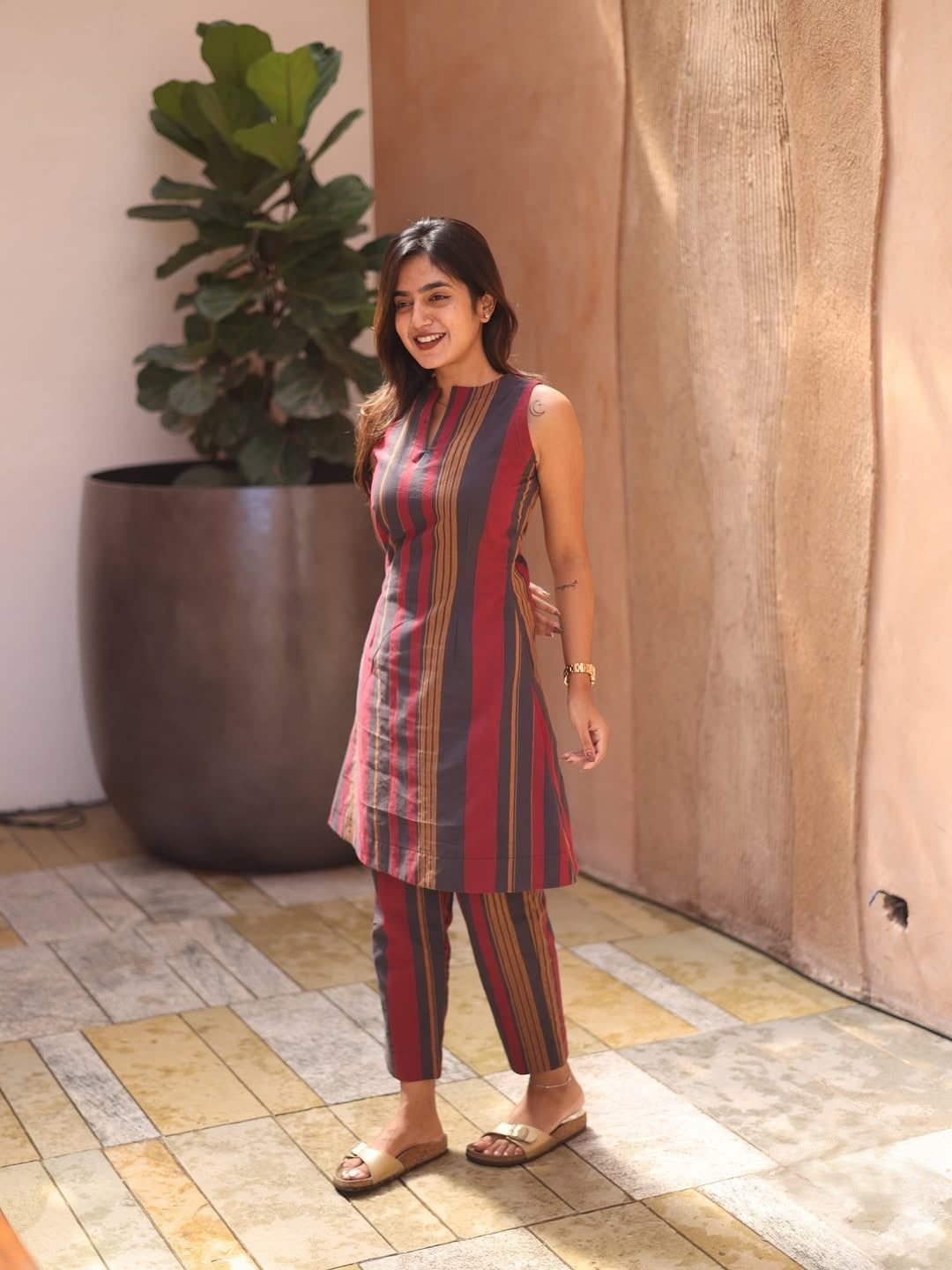 A beautiful black & Maroon stirps Kurtis set