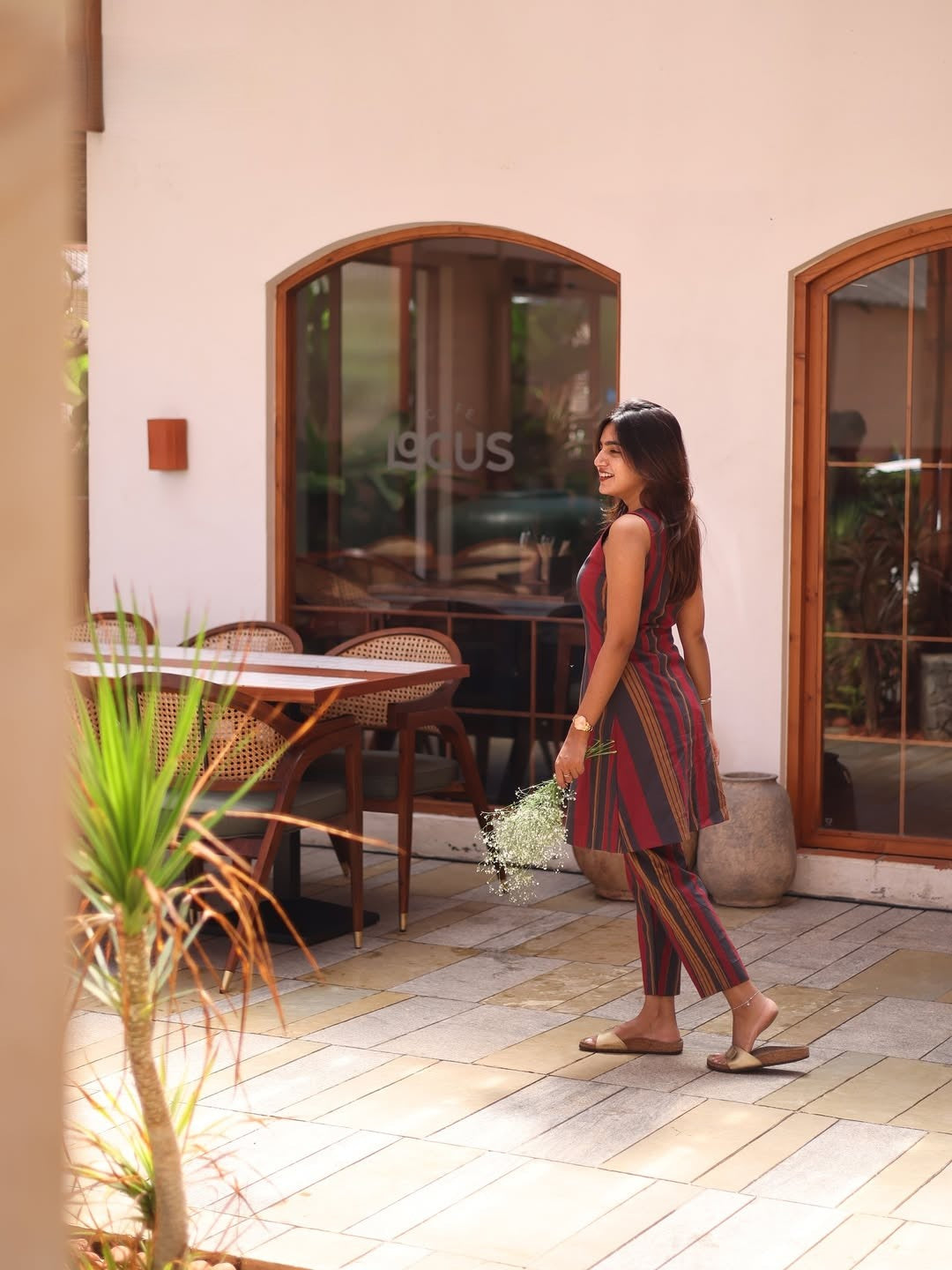 A beautiful black & Maroon stirps Kurtis set