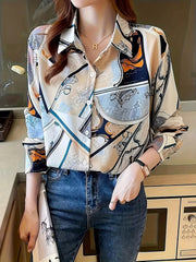 This stylish button-up shirt features a unique blend of abstract