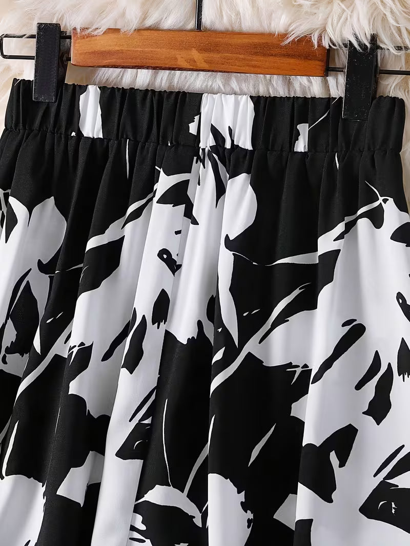 Modern Monochrome Floral Flared Skirt Black Base with White Abstract Florals and Airy Feminine Fit