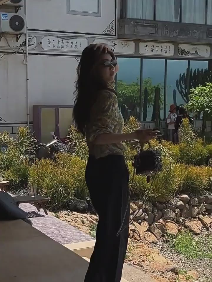 Load video: This elegant Abstract Watercolor Floral Top