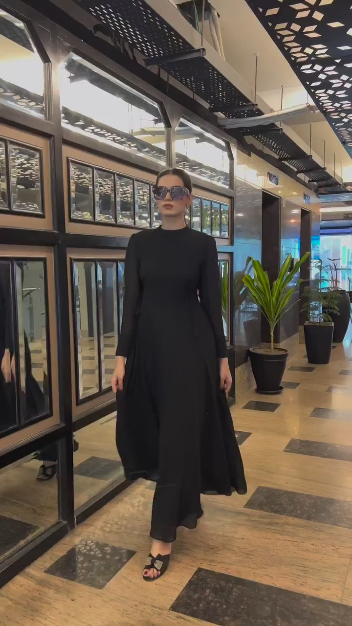 Load video: Black Georgette Maxi Dress with High Mock Neck and Sheer Full Sleeves